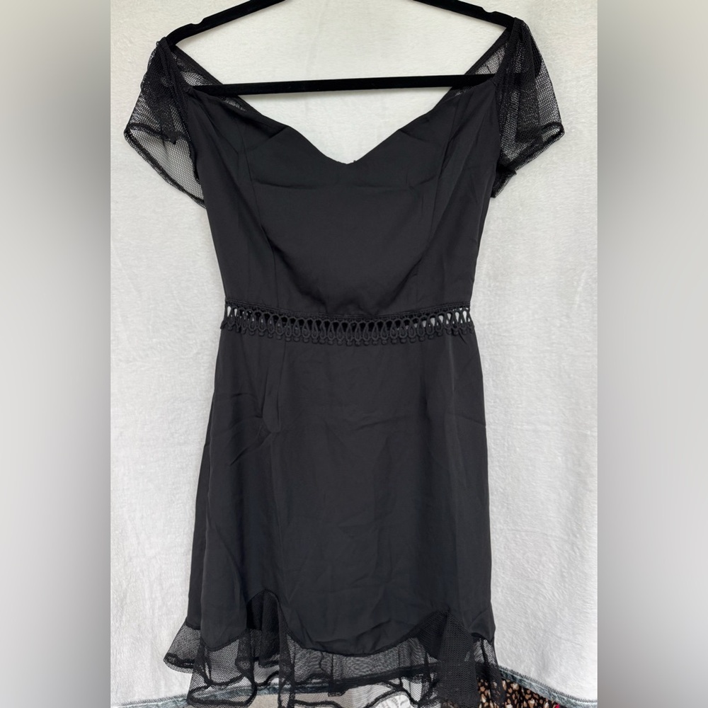 Elegant Black Dress with Mesh Sleeves